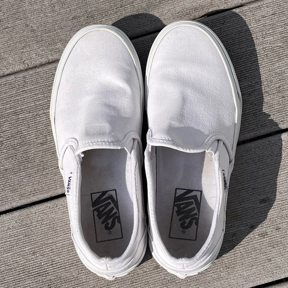 white slip on vans